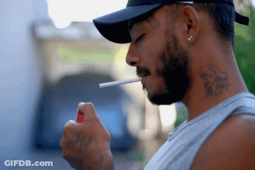 Man With Neck Tattoo Lighting Cigarette GIF