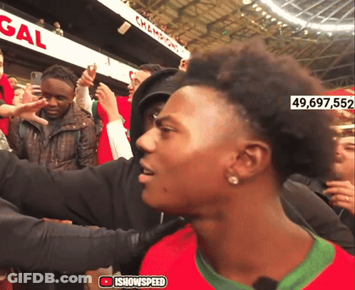 Man With Number 49,697,552 On Head In Front Of Crowd GIF