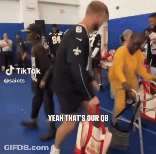Man With Number 6 Jersey Walking With Walker GIF