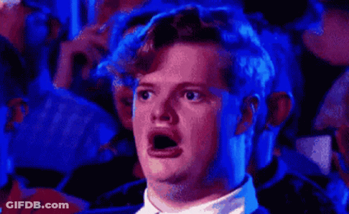 Man With Open Mouth In Crowd GIF