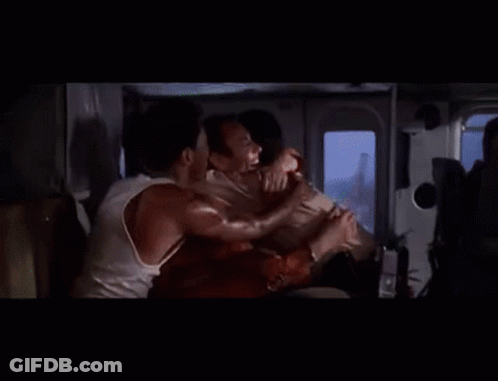 Man With Open Mouth Talking To Man In Car GIF
