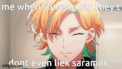 Man With Orange Hair And Green Streaks Says Me When Someone Says They Don't Even Like Saramilk GIF