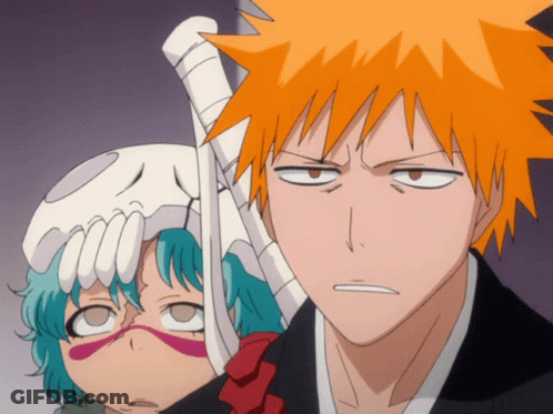 Man With Orange Hair Standing Next To Girl With Skull On Head GIF
