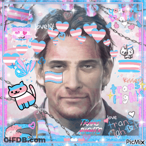 Man With Pink And Blue Hearts Saying Love Trans Rights GIF