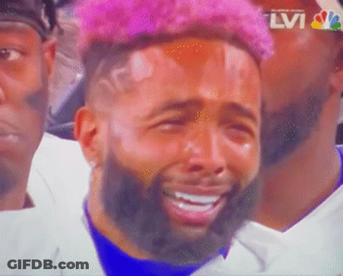 Man With Pink Hair And Beard Crying On TV Screen GIF