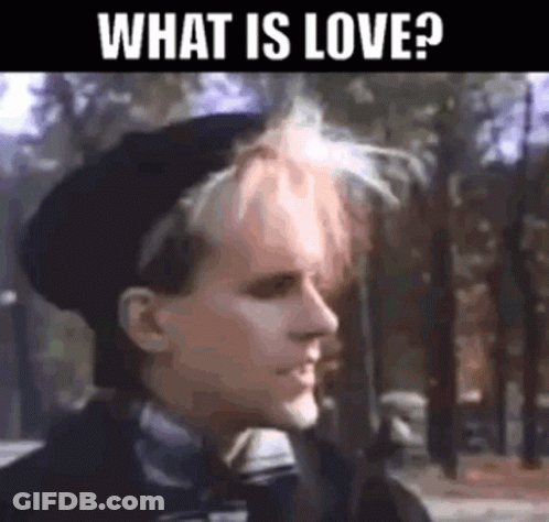Man With Pink Hair And Black Beret Looking At Camera GIF