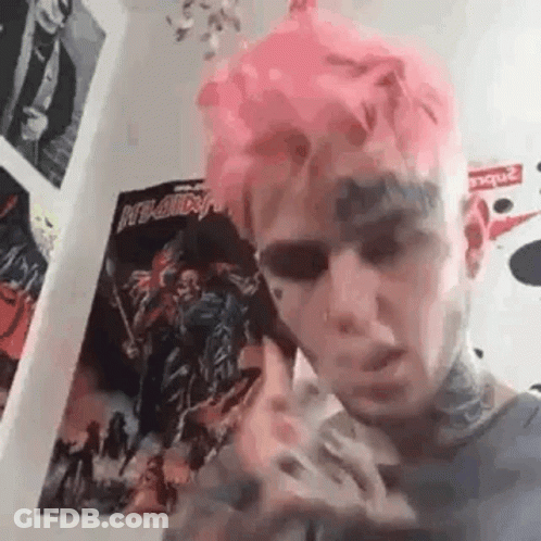 Man With Pink Hair And Face Tattoo GIF