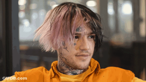 Man With Pink Hair And Face Tattoo GIF