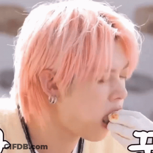 Man With Pink Hair Eating Food GIF
