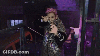 Man With Pink Hair Walking Down Stairs GIF