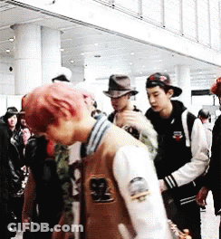 Man With Pink Hair Wearing Jacket Number 92 GIF