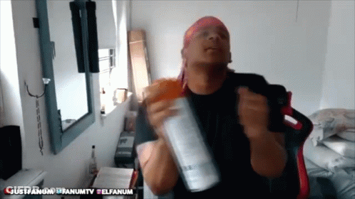 Man With Pink Headband Holding Spray Bottle In Front Of Mirror Justfanum GIF