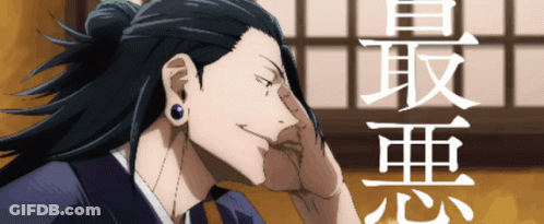 Man With Ponytail And Earrings Smiling GIF