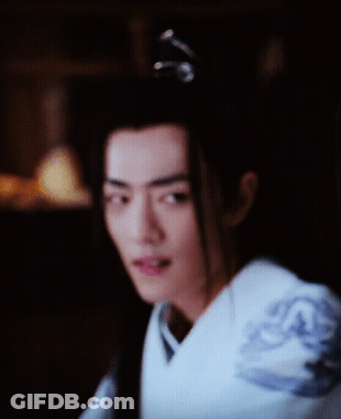 Man With Ponytail Close Up GIF