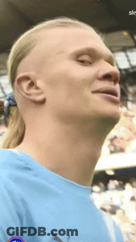 Man With Ponytail In Blue Sky Shirt GIF