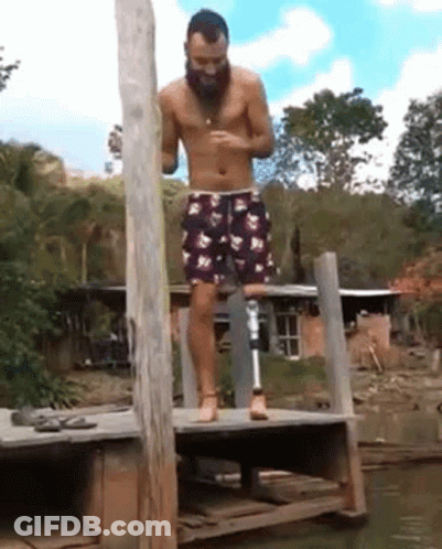 Man With Prosthetic Leg Overlooking Water GIF
