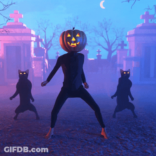 Man With Pumpkin Head In Cemetery With Black Cats GIF