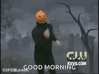 Man With Pumpkin Head Running In Cemetery Saying Good Morning GIF