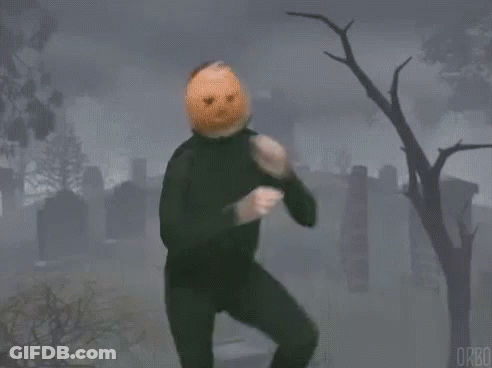 Man With Pumpkin On Head In Cemetery GIF