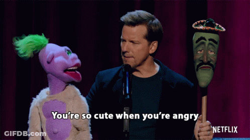 Man With Purple And Green Puppets And Sombrero GIF