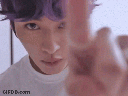 Man With Purple Hair Pointing At Camera GIF