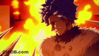 Man With Purple Hair Standing In Front Of Flame GIF