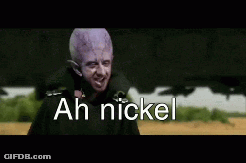Man With Purple Head Saying Ah Nickel In Field GIF