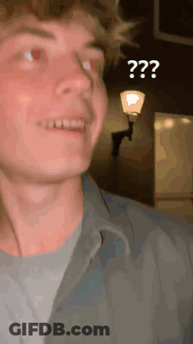 Man With Question Mark Above Head And Street Light GIF