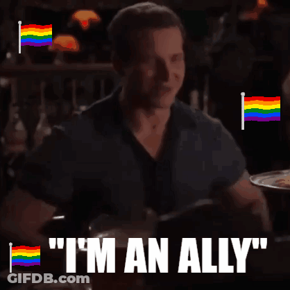 Man With Rainbow Flags Says I'm An Ally GIF