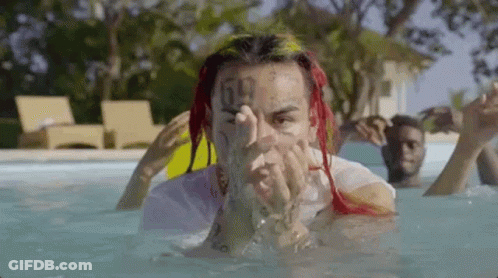 Man With Rainbow Umbrella Saying Im Back GIF