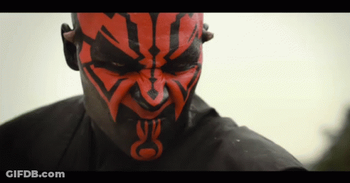 Man With Red And Black Face Paint And M GIF