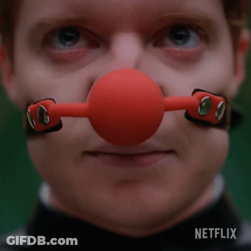 Man With Red Ball Gag On Nose And Netflix GIF