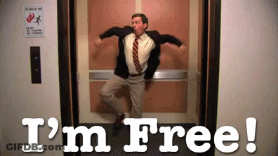 Man With Red Clown Nose And Pink Jacket Raising Arm GIF
