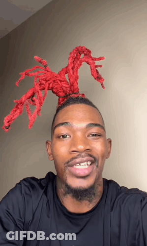 Man With Red Dreadlocks Smiling GIF