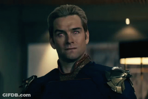 Man With Red Eyes And Shoulder Armor GIF