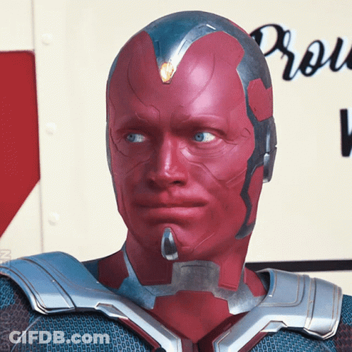 Man With Red Eyes And Silver Helmet In Front Of Production Sign GIF