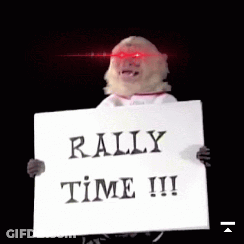 Man With Red Eyes Holding Rally Sign GIF