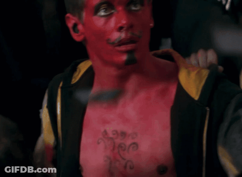 Man With Red Face Paint And I Love You Chest Tattoo GIF