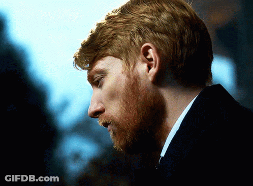 Man With Red Hair And Beard Looking Down GIF