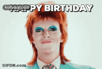 Man With Red Hair And Blue Eye Shadow Saying Happy Birthday GIF