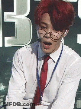 Man With Red Hair, Glasses, And Name Tag GIF