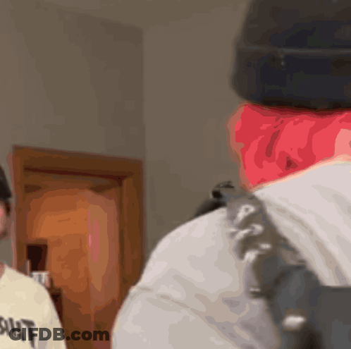 Man With Red Hair In Black Beanie Wearing Ant Shirt GIF