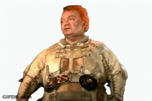 Man With Red Hair In Costume GIF