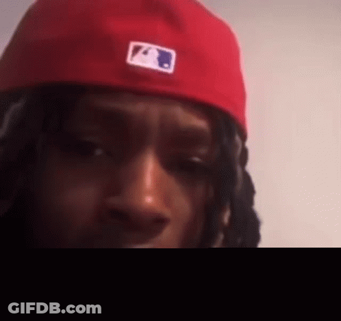 Man With Red Hat And Dreadlocks GIF