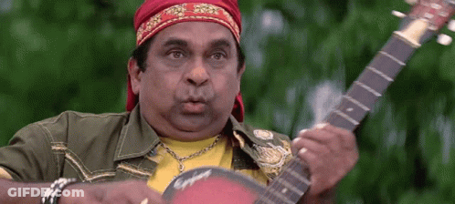 Man With Red Headband Playing Guitar GIF