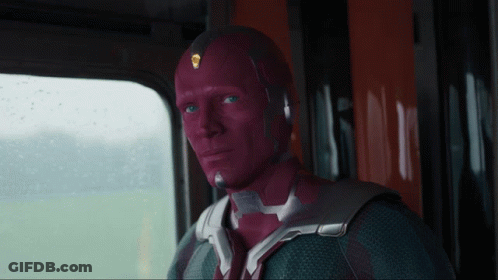 Man With Red Mask Looking Out Window GIF