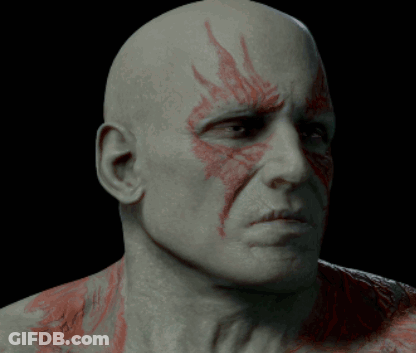 Man With Red Paint On Face GIF