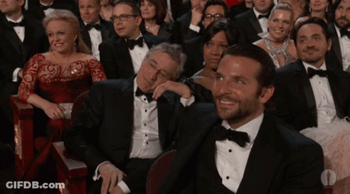 Man With Red Spot On Face Sitting In Back Seat Of Car GIF