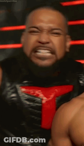 Man With Red T Making Funny Face GIF