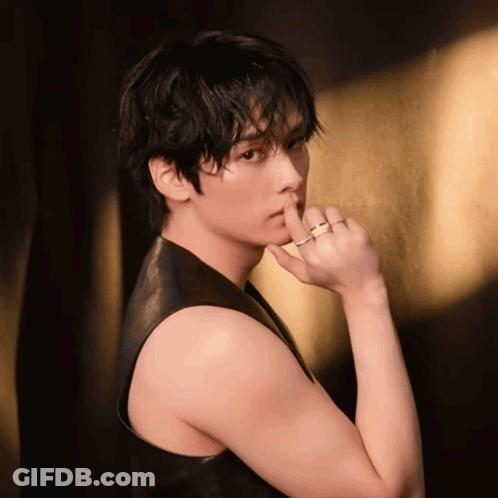 Man With Ring And Leather Vest GIF